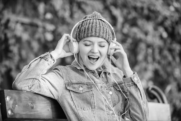 happiness audio book style music hipster woman headphones modern technology instead reading relax park hipster girl with mp3 player listening music park elearning concept 474717 69161